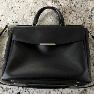 Tumi briefcase. Black with blue lining.